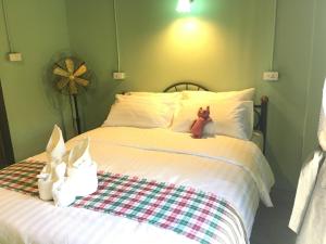 Postel nebo postele na pokoji v ubytování Talardkao Balcony Krabi