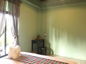 Postel nebo postele na pokoji v ubytování Talardkao Balcony Krabi