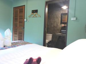 Postel nebo postele na pokoji v ubytování Talardkao Balcony Krabi