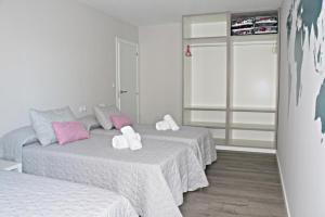 Postel nebo postele na pokoji v ubytování Apartamentos Credencial