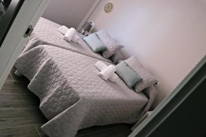 Postel nebo postele na pokoji v ubytování Apartamentos Credencial