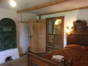 Rúm í herbergi á Chalet Hinterbreiteneben