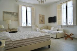 TV a/nebo společenská místnost v ubytování Hotel La Primula