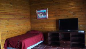 A television and/or entertainment centre at Atitlan Villas