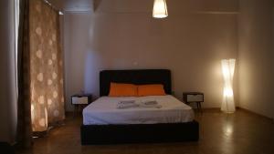 Posteľ alebo postele v izbe v ubytovaní The Victoria Square Exceptional Apartments
