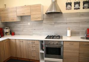 Kuchyňa alebo kuchynka v ubytovaní Apartament Parkowa
