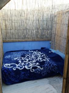 Postelja oz. postelje v sobi nastanitve AliBaba Apartment Hostel Bamboo Rooftop Room