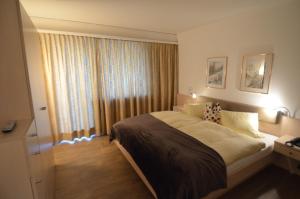 Postel nebo postele na pokoji v ubytování Hotel Belmont