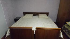 Postel nebo postele na pokoji v ubytování Apartment on Karla Marksa 8