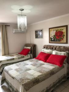 Кровать или кровати в номере Via Caldas Exclusive