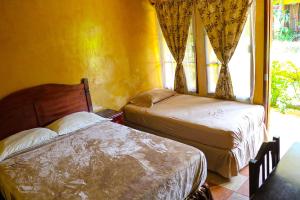 Krevet ili kreveti u jedinici u okviru objekta Posada Gema de Copan