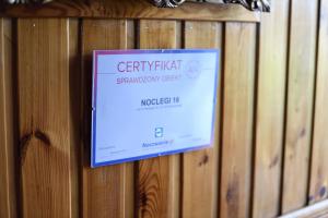 Certyfikat, podpis lub inny dokument wystawiony w obiekcie Noclegi16
