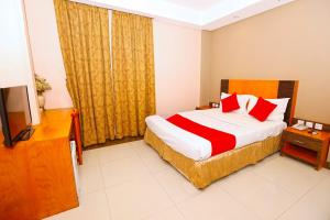 Postel nebo postele na pokoji v ubytování Sea Shell Hotel
