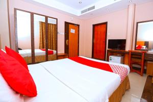 Postel nebo postele na pokoji v ubytování Sea Shell Hotel