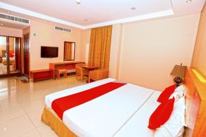 TV a/nebo společenská místnost v ubytování Sea Shell Hotel