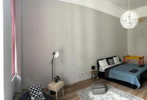 Posteľ alebo postele v izbe v ubytovaní Palace - Belvárosi Apartman Eger