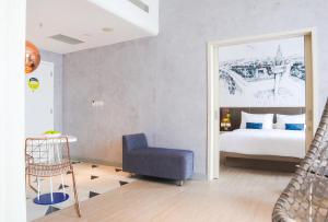 Letto o letti in una camera di YELLO Hotel Harmoni