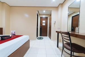 Voodi või voodid majutusasutuse RedDoorz near Olongapo Bus Terminal toas