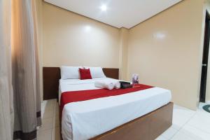 Voodi või voodid majutusasutuse RedDoorz near Olongapo Bus Terminal toas