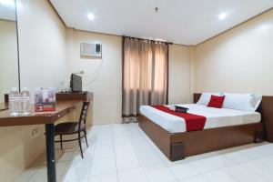 Voodi või voodid majutusasutuse RedDoorz near Olongapo Bus Terminal toas