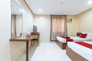 Voodi või voodid majutusasutuse RedDoorz near Olongapo Bus Terminal toas