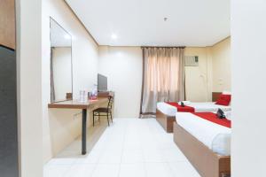 Voodi või voodid majutusasutuse RedDoorz near Olongapo Bus Terminal toas