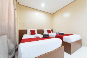 Voodi või voodid majutusasutuse RedDoorz near Olongapo Bus Terminal toas