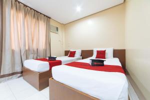 Voodi või voodid majutusasutuse RedDoorz near Olongapo Bus Terminal toas