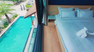 Ліжко або ліжка в номері Pleasant Chiangmai