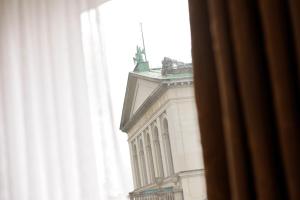 a view of a building from a window at Kastens Hotel Luisenhof in Hannover