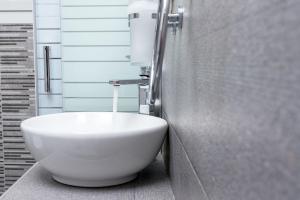 A bathroom at Lyto by Heloni Apartments