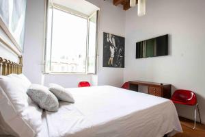 Postel nebo postele na pokoji v ubytování "Camera Con Vista" Bergamo Alta