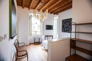 Postel nebo postele na pokoji v ubytování "Camera Con Vista" Bergamo Alta