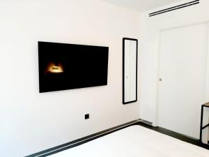 TV a/nebo společenská místnost v ubytování Hotel Melibea by gaiarooms