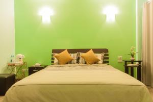 Postel nebo postele na pokoji v ubytování Nam Talay Resort