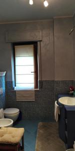 Kúpeľňa v ubytovaní Dormo da Isa