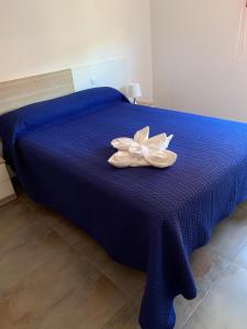 Postel nebo postele na pokoji v ubytování Seifía 2A