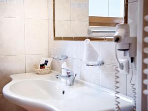 Vannituba majutusasutuses Aktiv & Vitalhotel Bergcristall