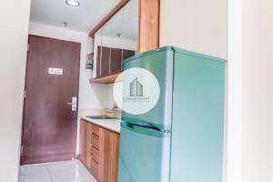 Kuchyň nebo kuchyňský kout v ubytování Apartmen Soekarno Hatta by C Management 4