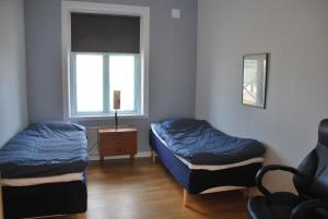 Postel nebo postele na pokoji v ubytování Svea hotell, Vollsjö
