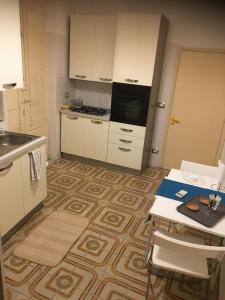 Kuchyň nebo kuchyňský kout v ubytování VegApartment