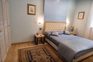 Postel nebo postele na pokoji v ubytování Brunelli B&B