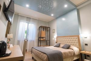 Postel nebo postele na pokoji v ubytování Brunelli B&B