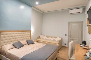 Postel nebo postele na pokoji v ubytování Brunelli B&B