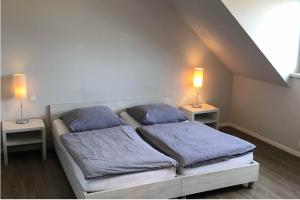 Un ou plusieurs lits dans un hébergement de l'établissement Haus Schönewald