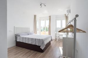 Posteľ alebo postele v izbe v ubytovaní LU&CIA CANDADO BEACH RELAX + 28 fotografií