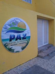 a sign on the side of a building at Hostel da Paz in Maceió +14 photos