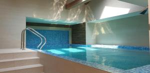 Bazén v ubytování Baobab Suites nebo v jeho okolí