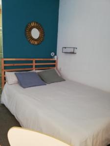 Ένα ή περισσότερα κρεβάτια σε δωμάτιο στο Estudio acogedor