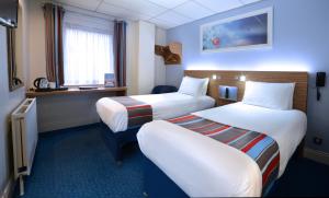 Uma cama ou camas num quarto em Travelodge Dublin Airport North 'Swords'